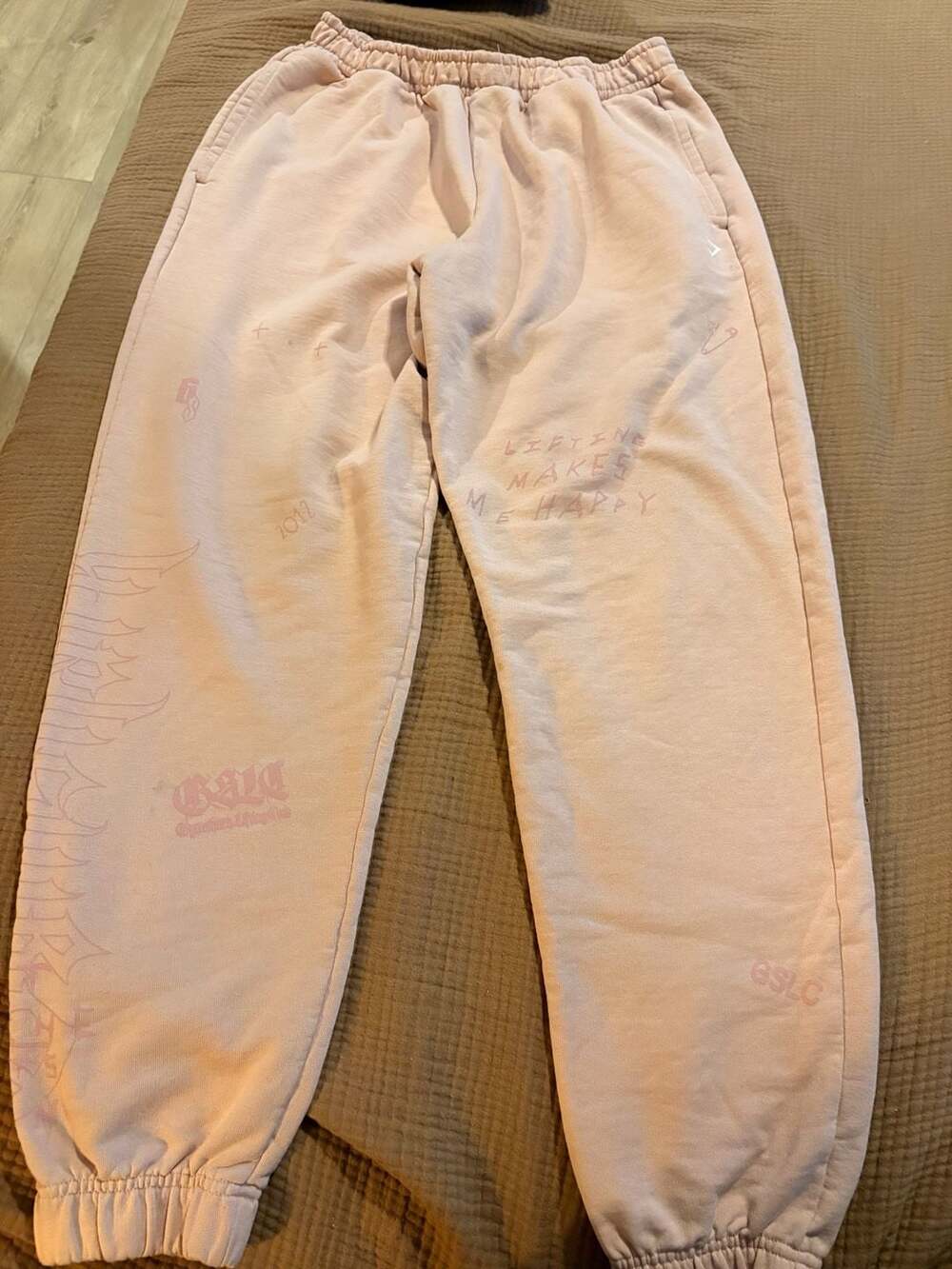 Gymshark Women's Graphic Print Lifestyle Sweatpants in Light Pink